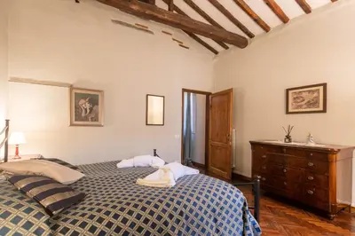Letto o letti in una camera di Borgo La Croce Apartment