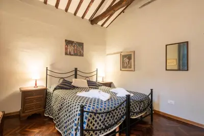 Letto o letti in una camera di Borgo La Croce Apartment