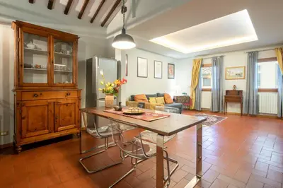 Area soggiorno di Borgo La Croce Apartment