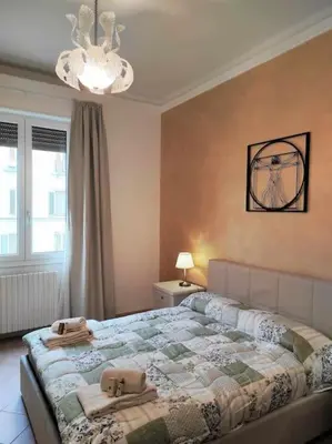 Letto o letti in una camera di Casa Raffaello Careggi