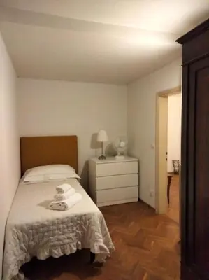 Letto o letti in una camera di Strategic 2BR Apartment