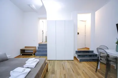 Letto o letti in una camera di Le Dantesche Boutique Apartments