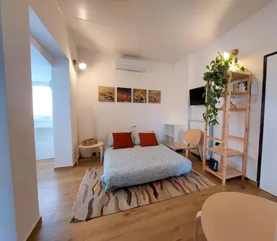 Letto o letti in una camera di Studio Archimedis in Florentia free parking