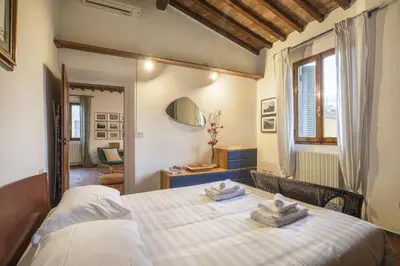 Letto o letti in una camera di La Casita de EL MALO - Sweet Dreams in Florence