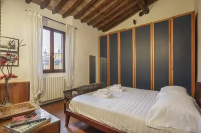 Letto o letti in una camera di La Casita de EL MALO - Sweet Dreams in Florence