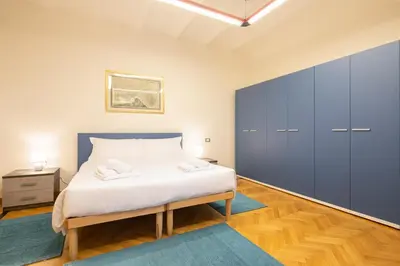 Letto o letti in una camera di Tintori Apartment