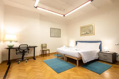Letto o letti in una camera di Tintori Apartment
