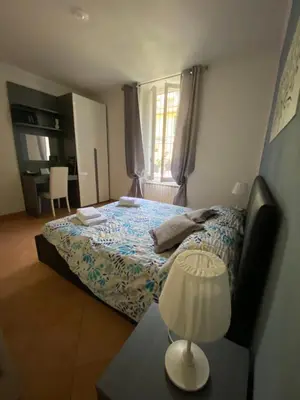 Letto o letti in una camera di Casa Arianna