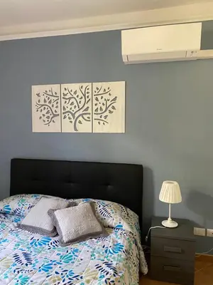 Letto o letti in una camera di Casa Arianna