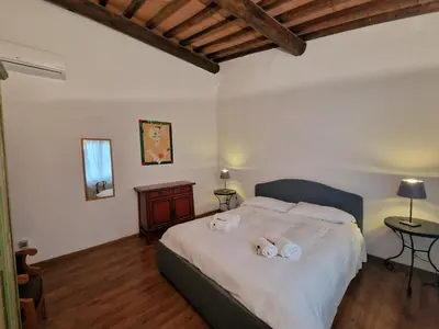 Letto o letti in una camera di Le Antiche Mura