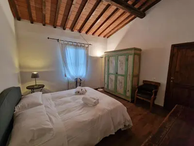Letto o letti in una camera di Le Antiche Mura