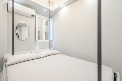 Letto o letti in una camera di Happy Florence Ponte Vecchio Bed UpDown