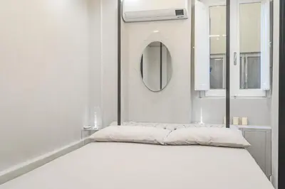 Letto o letti in una camera di Happy Florence Ponte Vecchio Bed UpDown