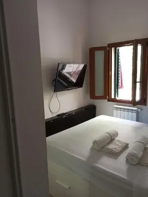 Letto o letti in una camera di Appartamento Centro Storico Firenze Cosy apartament in Florence