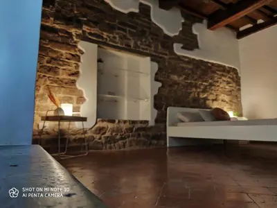 Letto o letti in una camera di Dante's Room dei Cerchi
