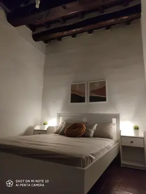 Letto o letti in una camera di Dante's Room dei Cerchi
