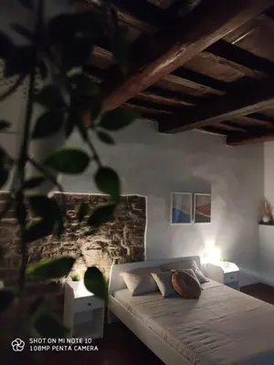 Letto o letti in una camera di Dante's Room dei Cerchi