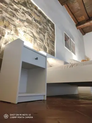 Letto o letti in una camera di Dante's Room dei Cerchi
