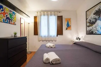 Letto o letti in una camera di Cozy Apartment In Borgo Dei Greci Firenze