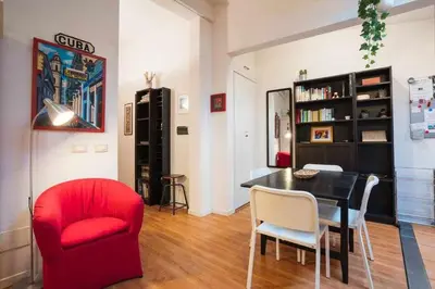 Area soggiorno di Cozy Apartment In Borgo Dei Greci Firenze