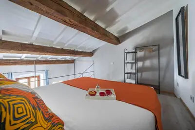 Letto o letti in una camera di Santo Spirito's Nest