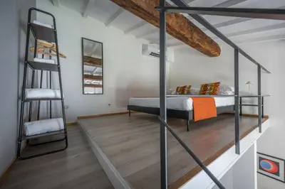 Letto o letti in una camera di Santo Spirito's Nest