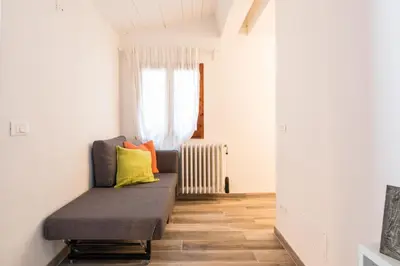 Area soggiorno di Centrale APT con terrazza a 5min dal Pitti! - HomeUnity