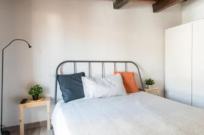 Letto o letti in una camera di Centrale APT con terrazza a 5min dal Pitti! - HomeUnity