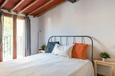 Letto o letti in una camera di Centrale APT con terrazza a 5min dal Pitti! - HomeUnity