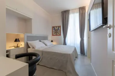 Letto o letti in una camera di Stylish four bedrooms apartment - Florence center