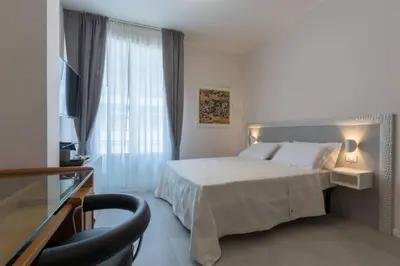 Letto o letti in una camera di Stylish four bedrooms apartment - Florence center