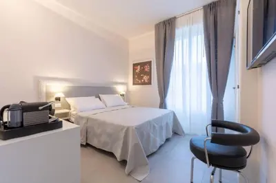 Letto o letti in una camera di Stylish four bedrooms apartment - Florence center