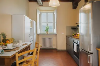 Cucina o angolo cottura di Apartments Florence - Villa La Medicea with swimming pool