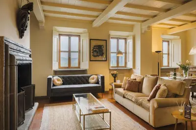 Area soggiorno di Apartments Florence - Villa La Medicea with swimming pool