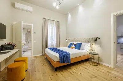 Letto o letti in una camera di Dimora72 Luxury Rooms