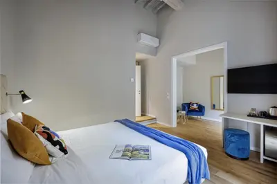 Letto o letti in una camera di Dimora72 Luxury Rooms