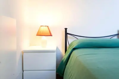 Letto o letti in una camera di Luxury Bi-locale San Niccolò Wi-fi