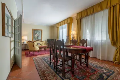Area soggiorno di CASA ADRIANA Elegante e luminosa