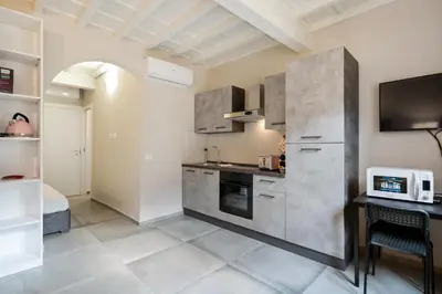 Cucina o angolo cottura di La Loggia della Signoria Charming Loft