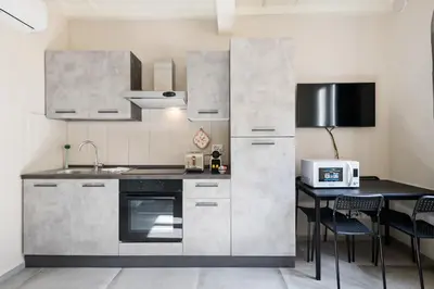 Cucina o angolo cottura di La Loggia della Signoria Charming Loft