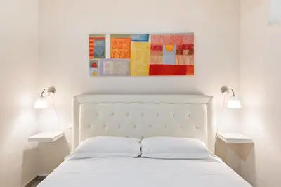 Letto o letti in una camera di Il Palazzo della Signoria Modern Loft