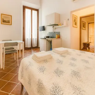 Letto o letti in una camera di Loft Ortensia garden WiFi air conditioning