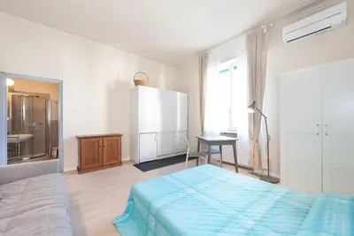 Letto o letti in una camera di loft PINO centrale, A/C wifi
