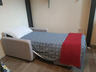 Letto o letti in una camera di Due Strade Loft Firenze