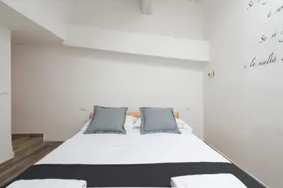 Letto o letti in una camera di Design Center Florence APT - HomeUnity