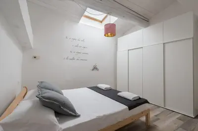 Letto o letti in una camera di Design Center Florence APT - HomeUnity