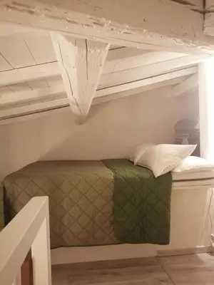Letto o letti in una camera di BRIC NEST il luogo ideale per la tua vacanza.