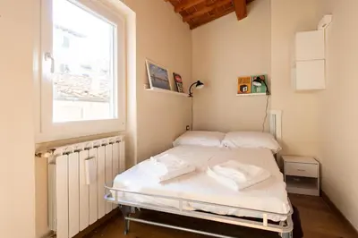Letto o letti in una camera di Modern & Bright in Oltrarno, Steps to Boboli & Pitti