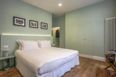 Letto o letti in una camera di Seggiole Boutique Apartment Ginestra