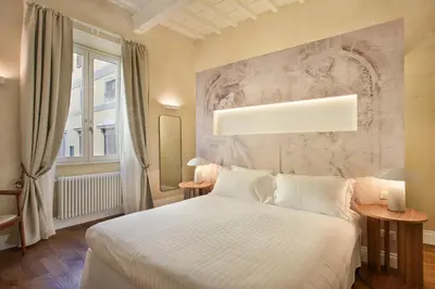 Letto o letti in una camera di Seggiole Boutique Apartment Iris